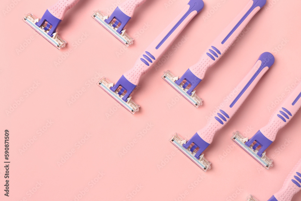 Composition with safety razors on pink background