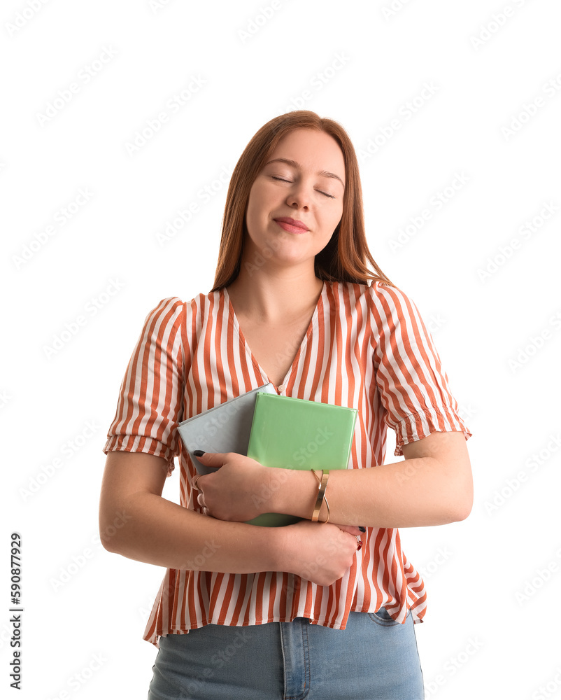 Teenage girl with books on white background