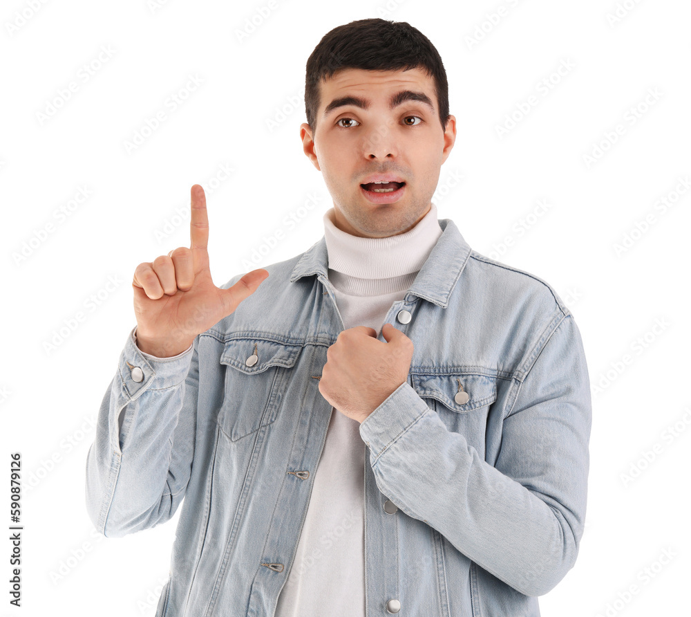 Young man showing loser gesture on white background