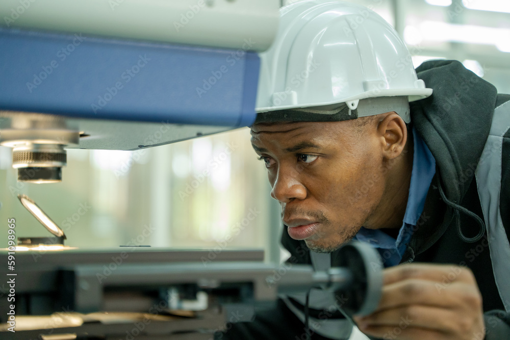 Engineer working with optimization of Robot Arm,Doing Robotic Maintenance Ideas.