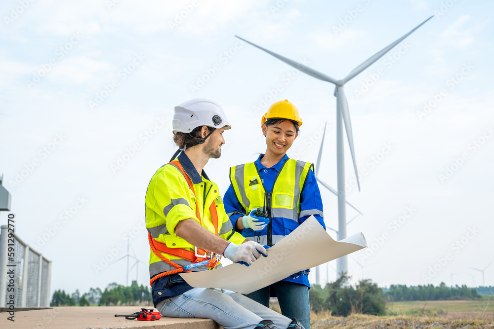 Engineer working and maintenance in wind turbine,Power generation Saving and using renewable energy 