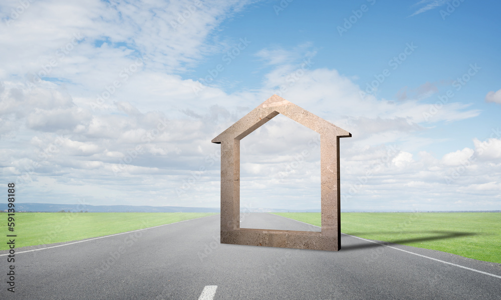 Conceptual background image of concrete home sign on asphalt road