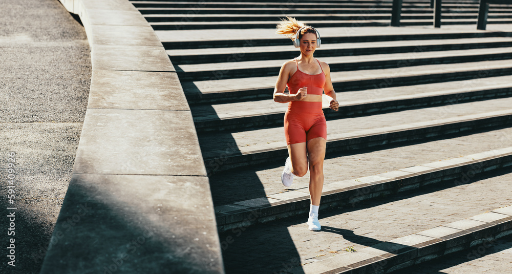 Female runner burning calories with a cardio workout