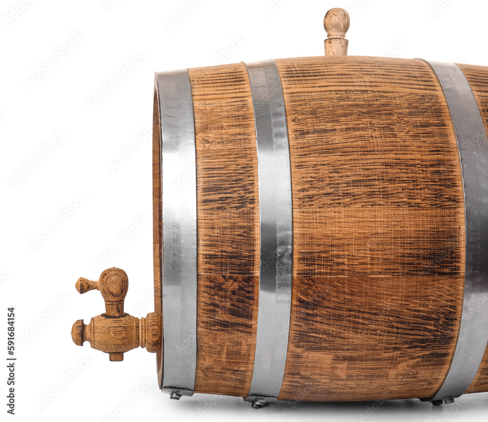 Oak barrel with metal hoops and tap isolated on white background