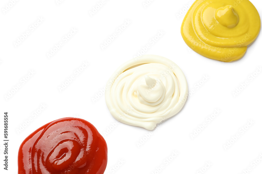 Samples of ketchup, mayonnaise and mustard isolated on white background