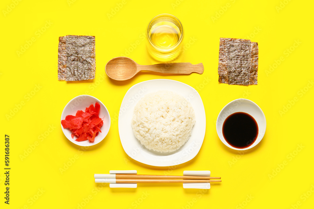 Composition with ingredients for preparing tasty sushi rolls on yellow background