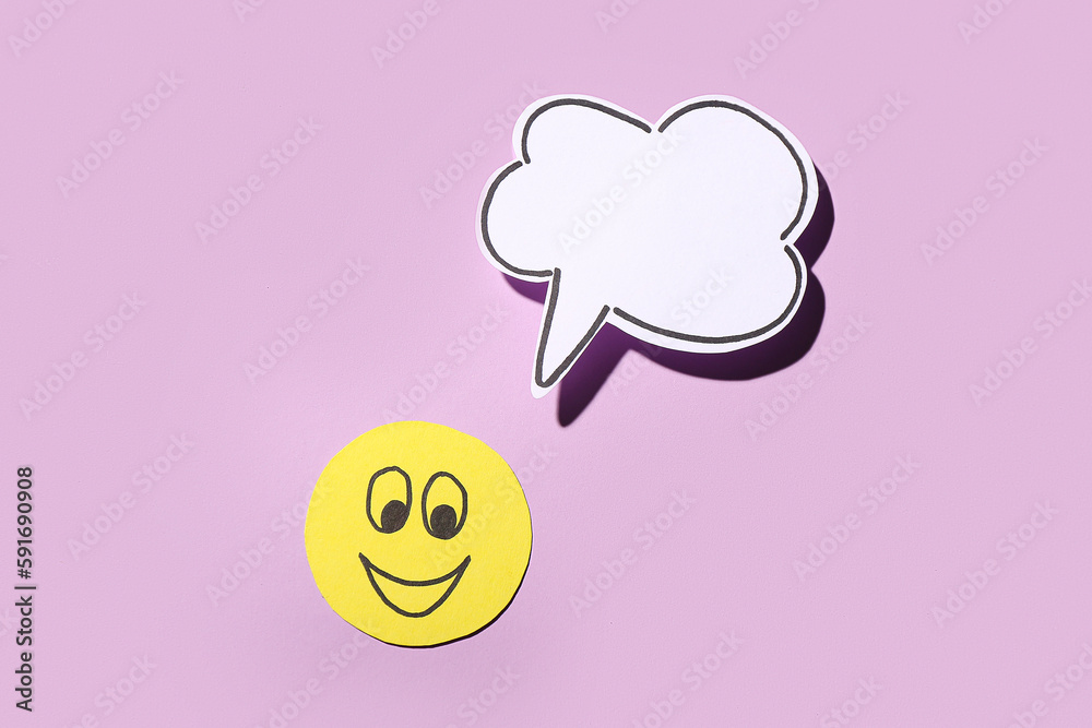 Paper smile with speech bubble on lilac background. Dialogue concept