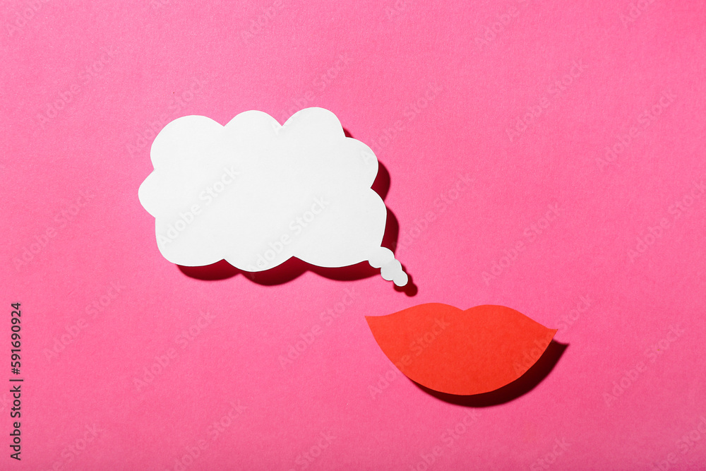 Paper lips with speech bubble on pink background. Dialogue concept