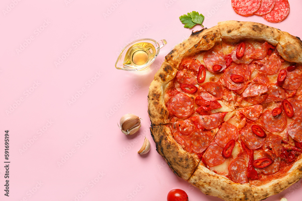 Delicious pepperoni pizza and ingredients on pink background