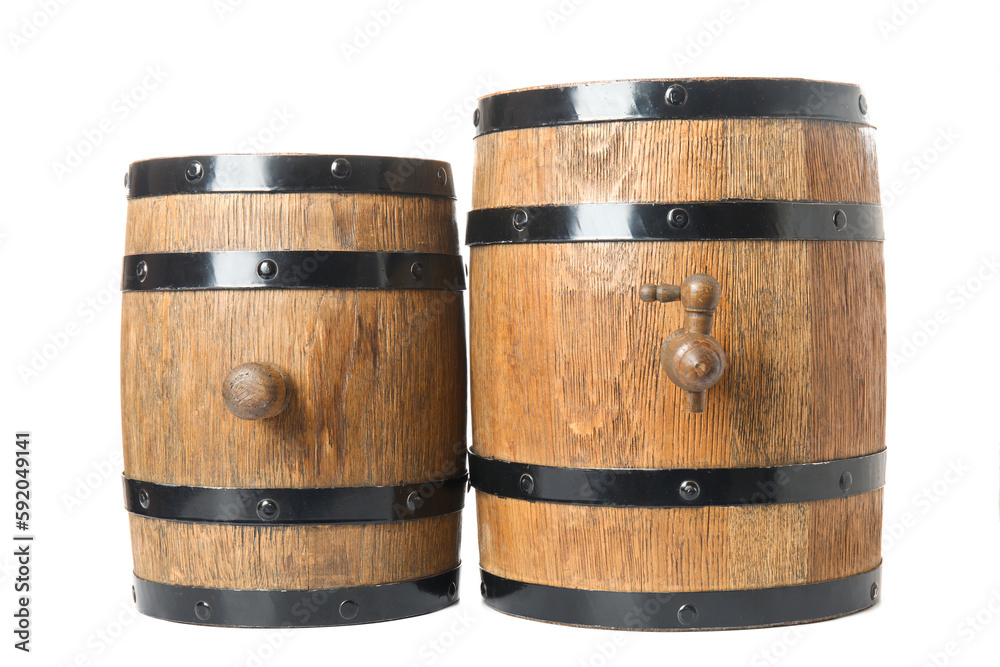 Oak barrels with metal hoops isolated on white background