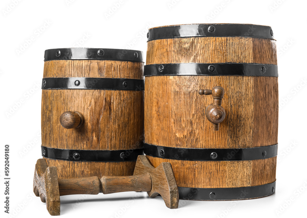 Oak barrels with metal hoops isolated on white background