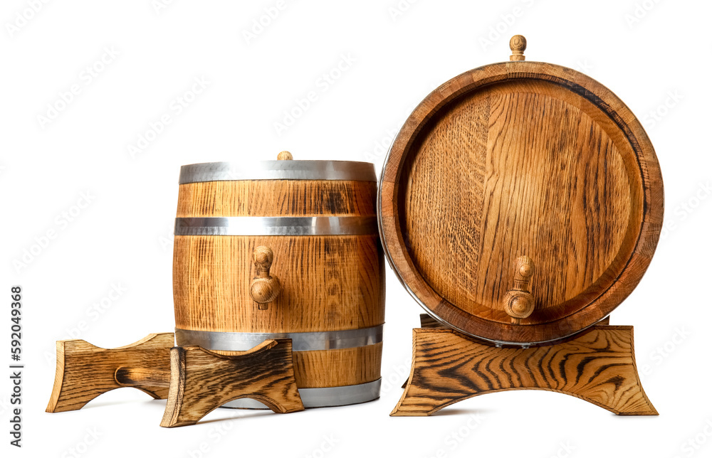 Oak barrels with metal hoops isolated on white background