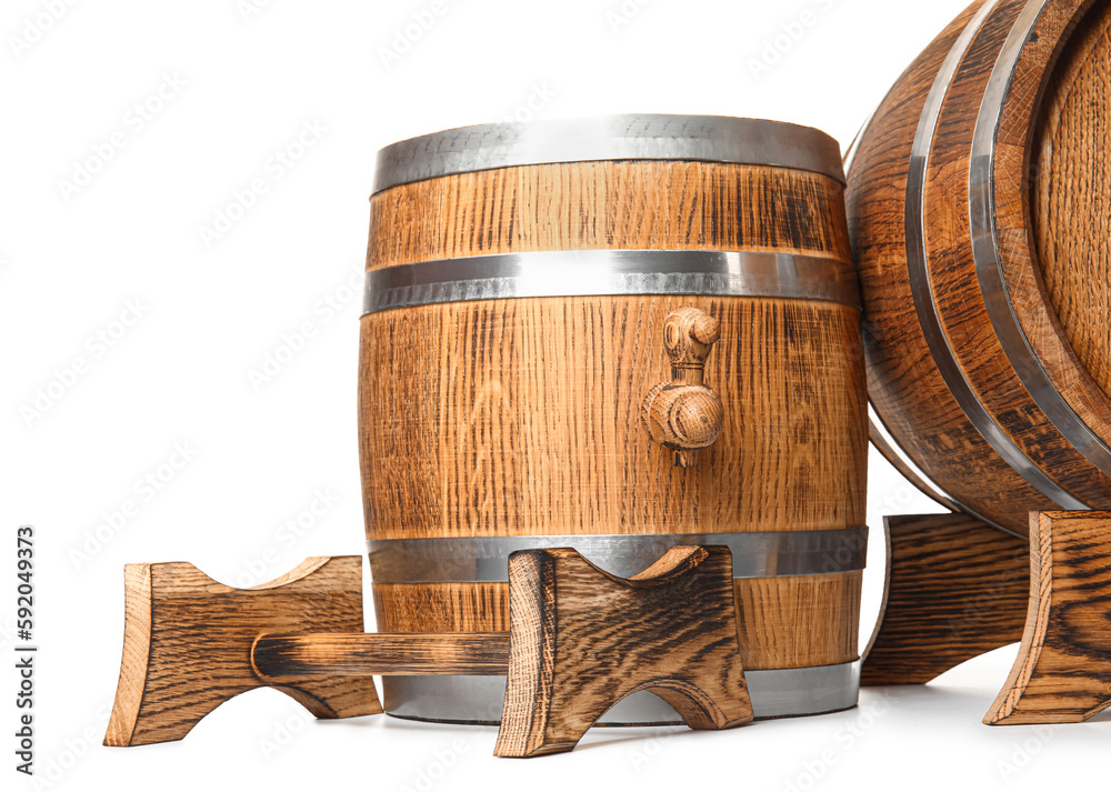 Oak barrels with metal hoops isolated on white background