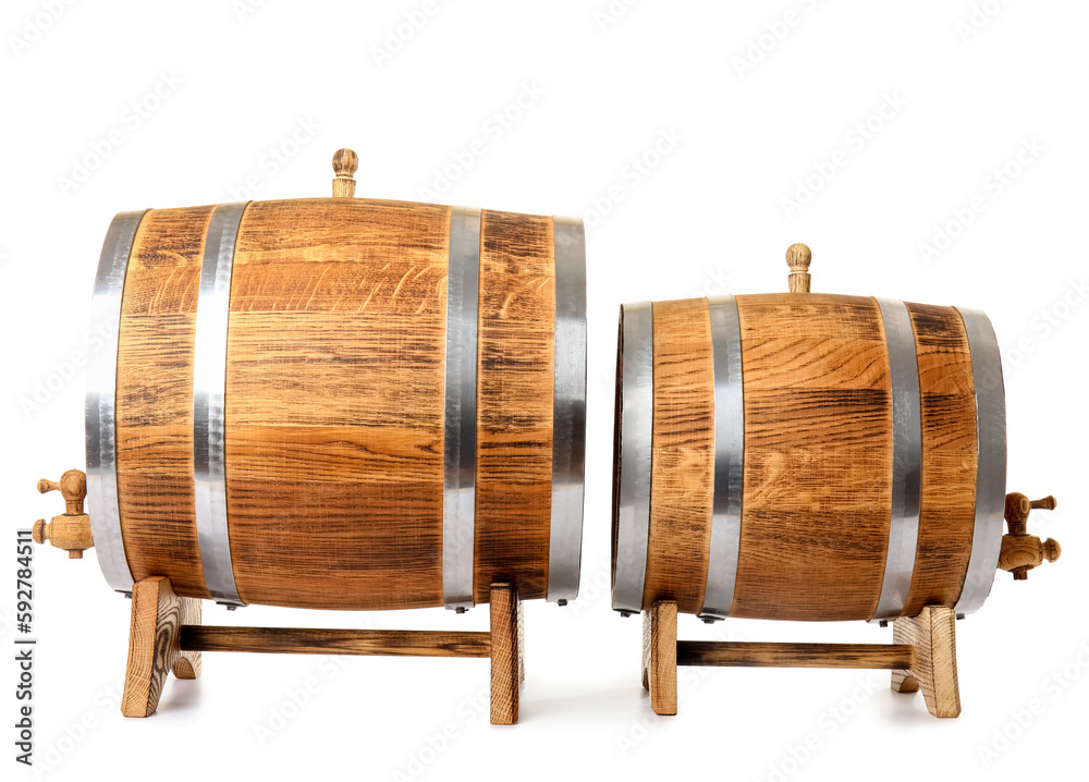 Oak barrels with metal hoops isolated on white background