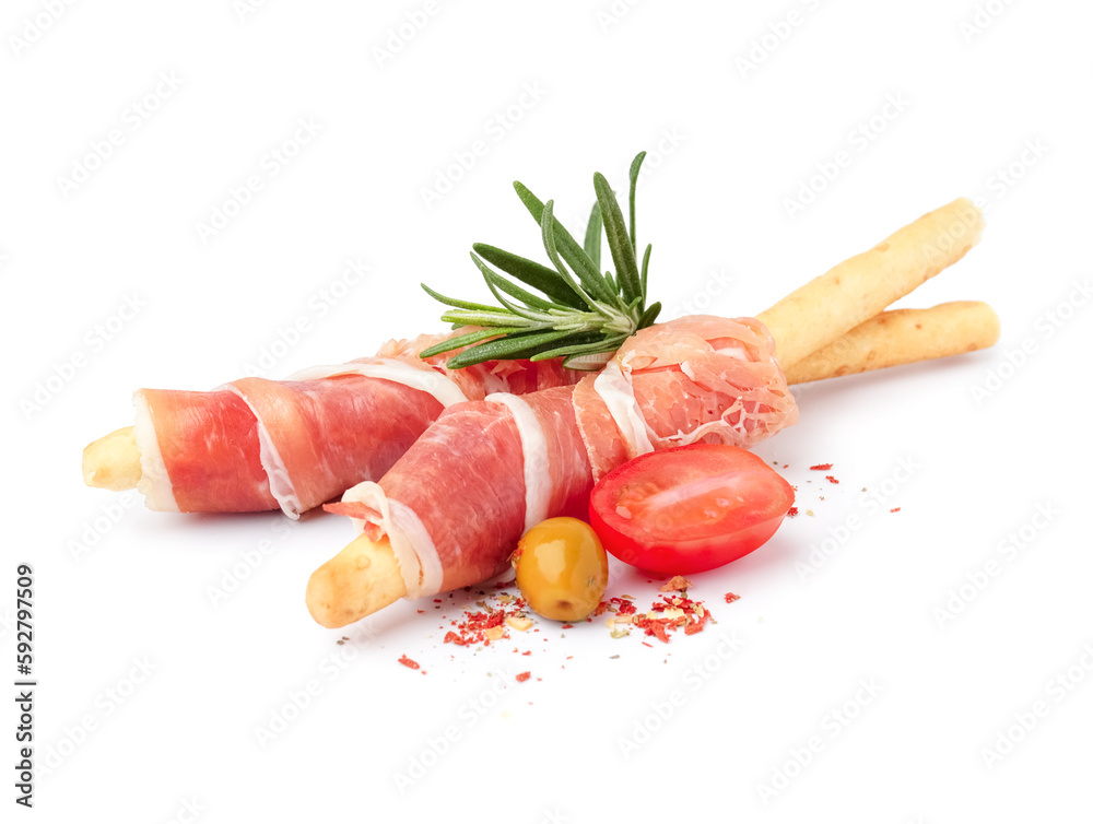 Tasty Italian Grissini with slices of jamon on white background