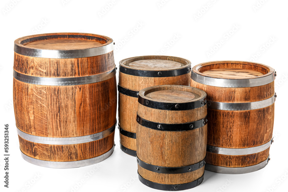 Oak barrels with metal hoops isolated on white background