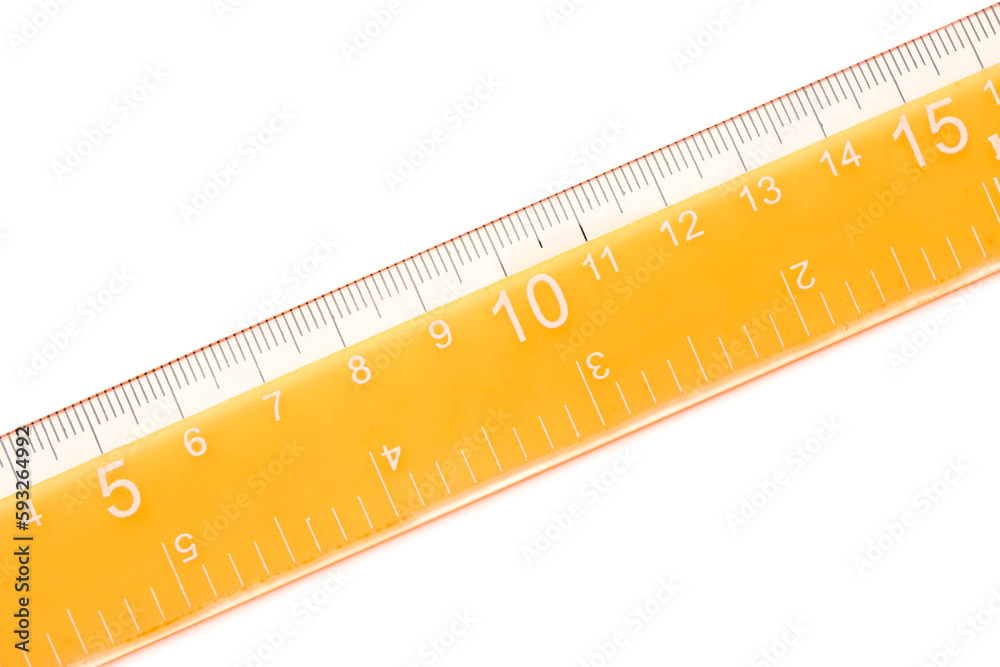 Orange plastic ruler on white background