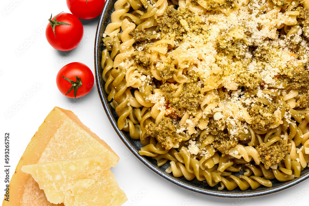 Plate of tasty Italian pasta with Parmesan cheese on white background, closeup