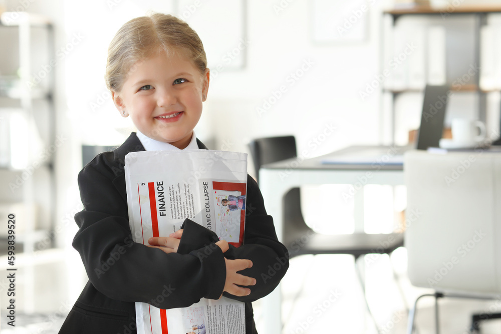 Funny little businesswoman with newspaper in office