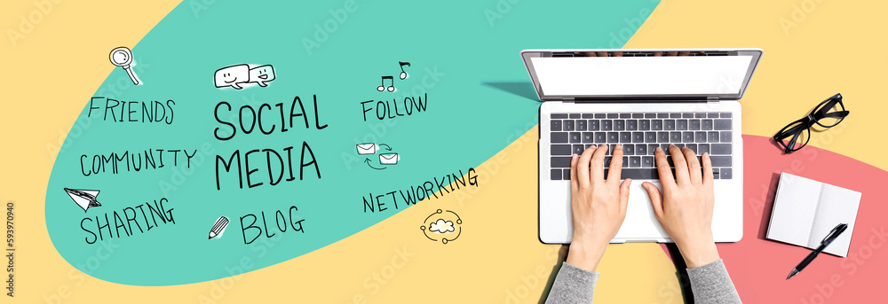 Social media theme with person using a laptop computer