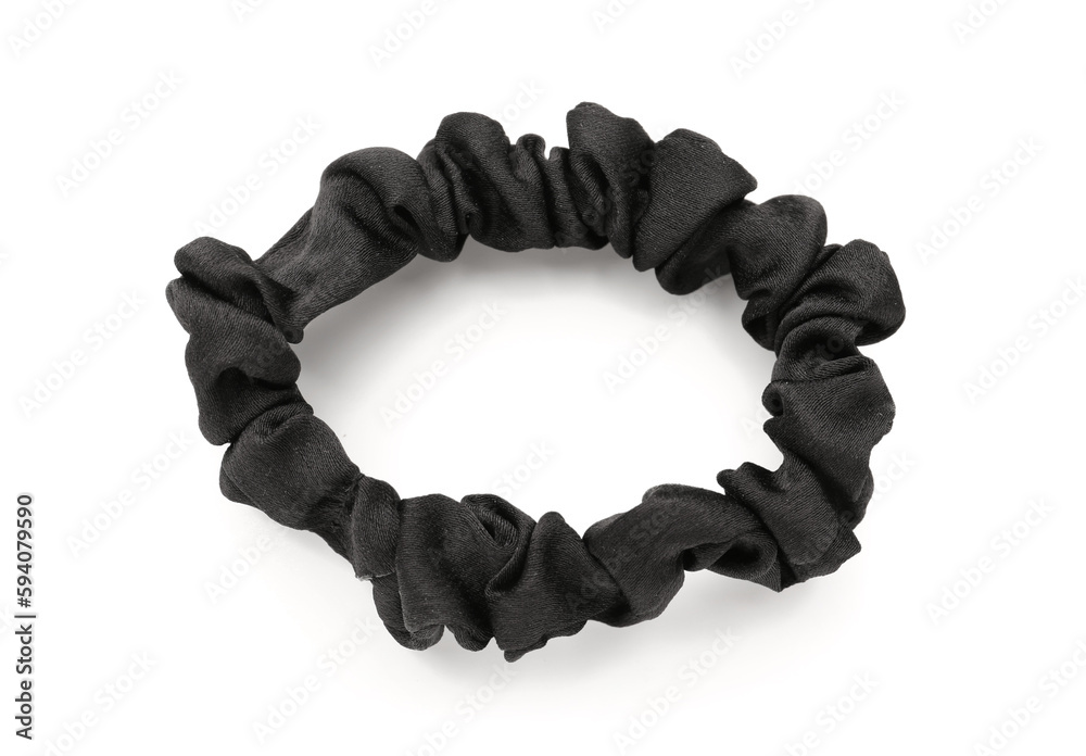 Black silk scrunchy on white background