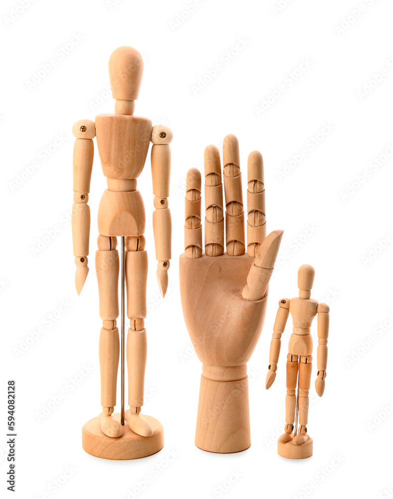 Wooden hand and mannequins on white background