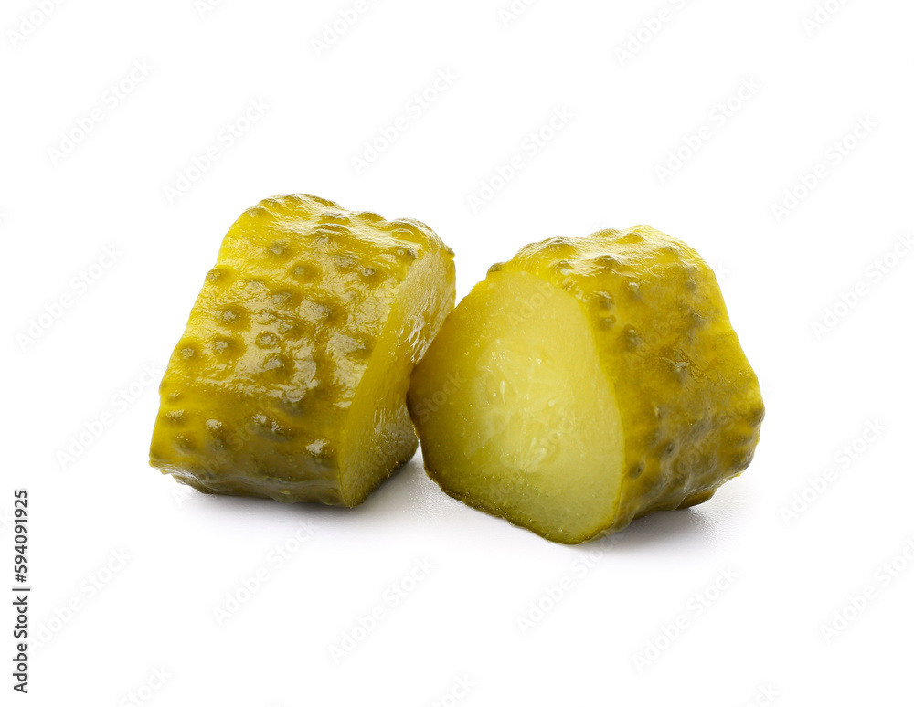 Tasty fermented cucumber pieces on white background