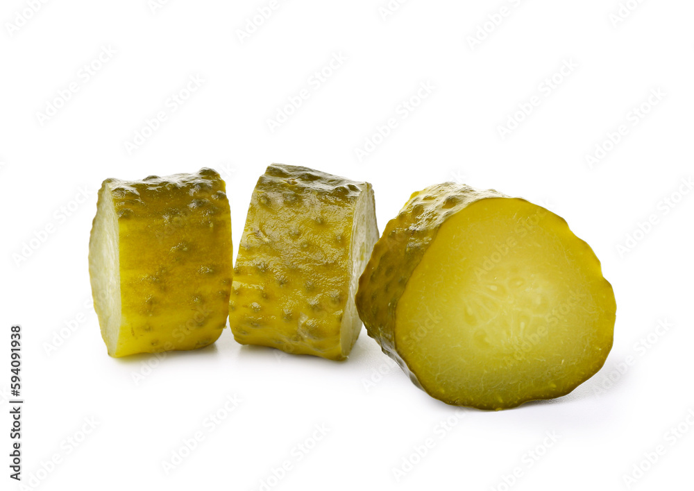 Tasty fermented cucumber pieces on white background