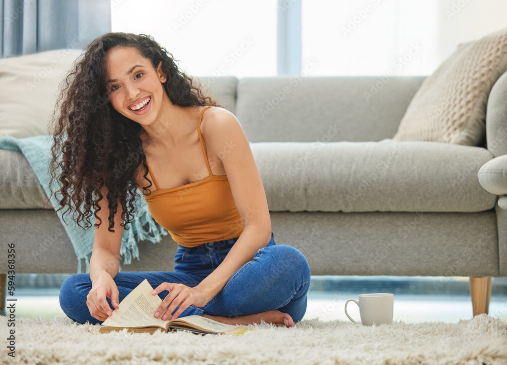 This is a real page turner. a young woman reading at home.