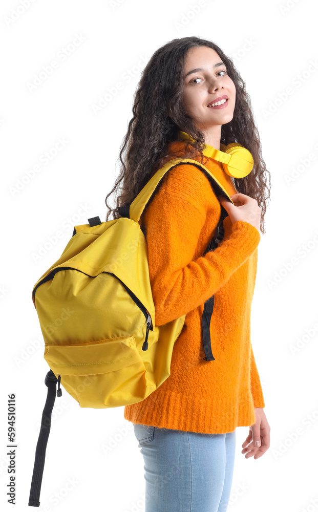 Female student with headphones and backpack on white background