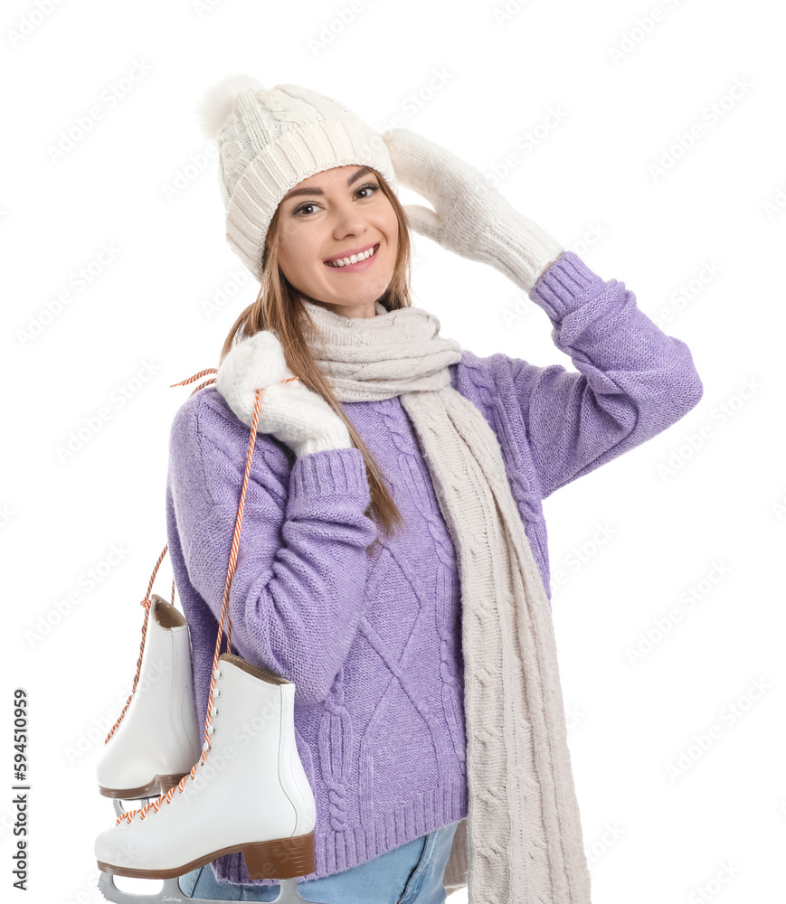 Pretty young woman with ice skates isolated on white background