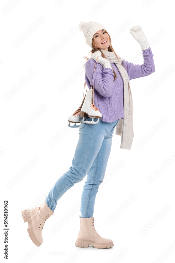 Pretty young woman with ice skates isolated on white background