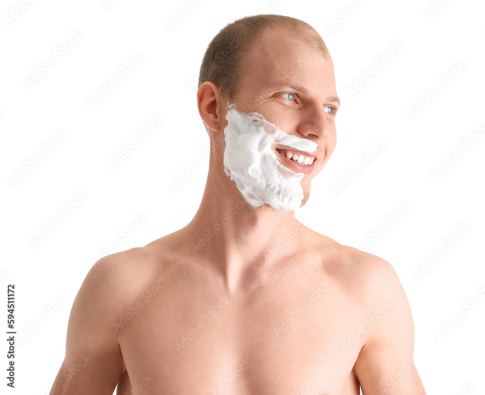 Young man with shaving foam on face against white background