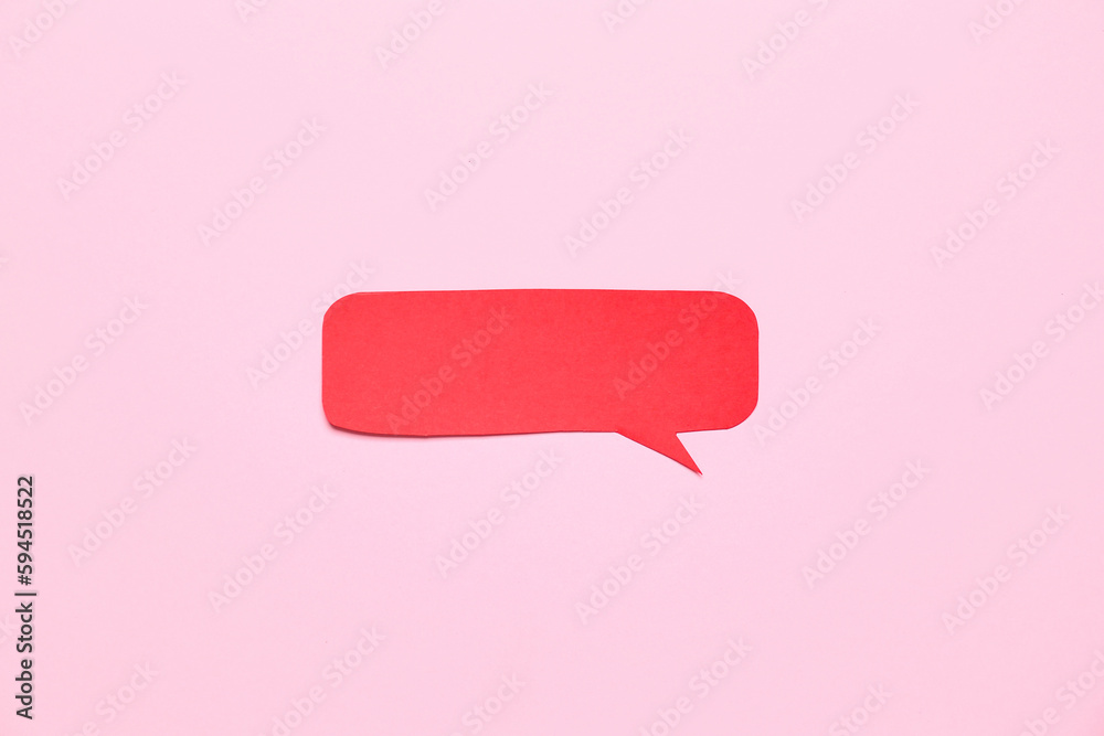 Blank paper speech bubble on pink background