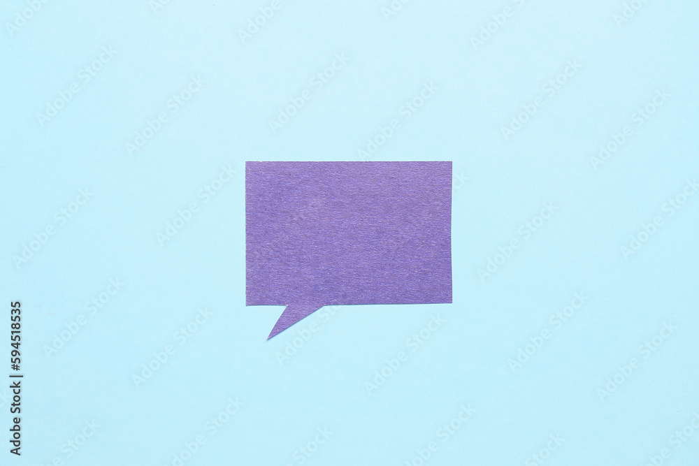 Blank paper speech bubble on blue background