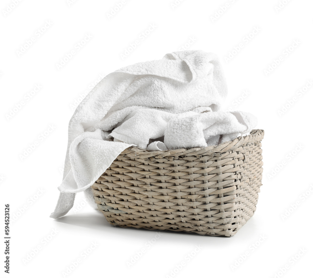 Basket with dirty towels on white background