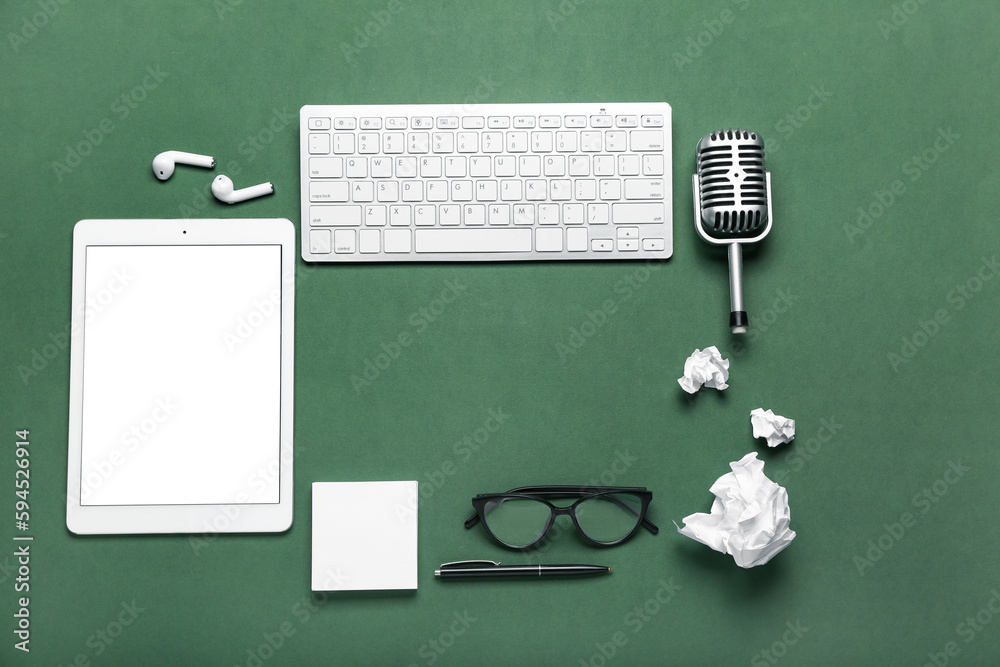 Frame made of journalists equipment on green background