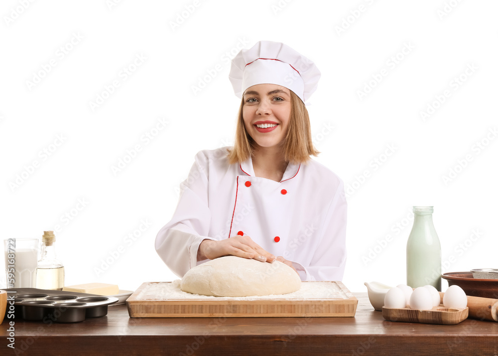 Female baker with raw dough at table on white background