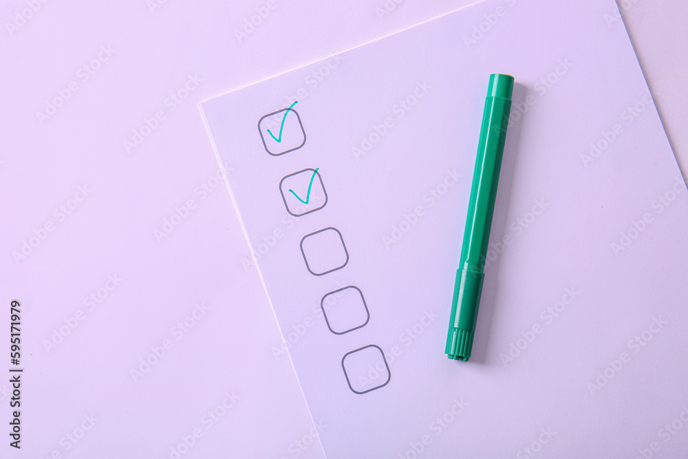 Checklist box with green marks and marker on white background