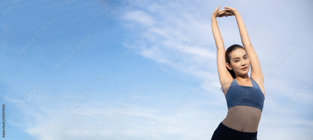 Young beauty Asian woman stretching workout outdoor rooftop. She warming up