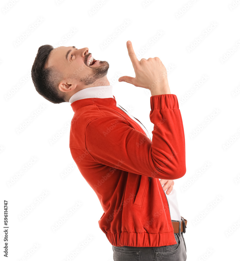 Handsome man showing loser gesture on white background