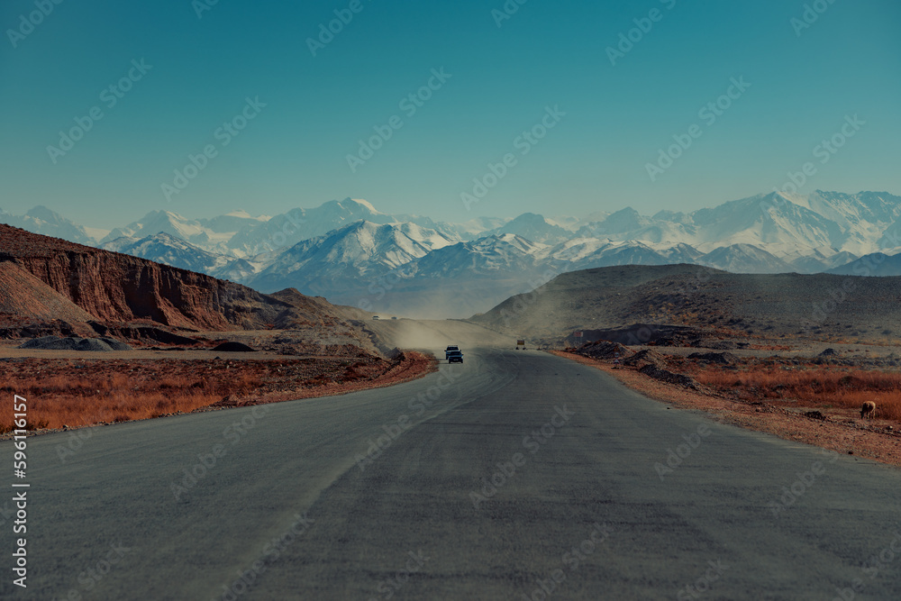 Cars on high mountains road, Kyrgyzstan