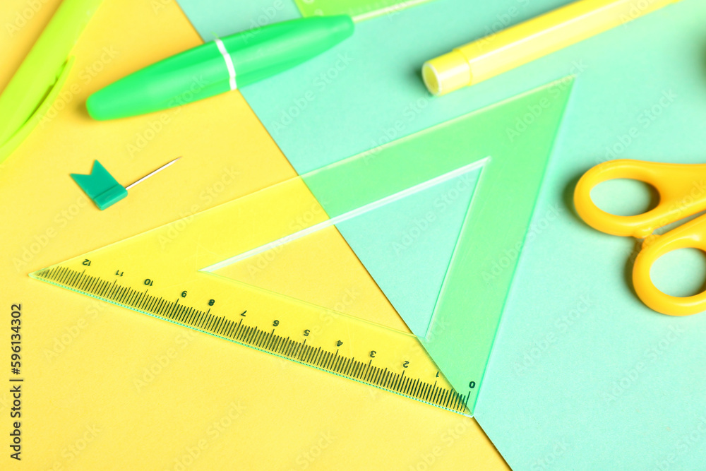 Stationery supplies on color background