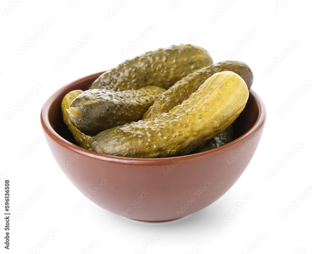 Bowl with tasty fermented cucumbers on white background