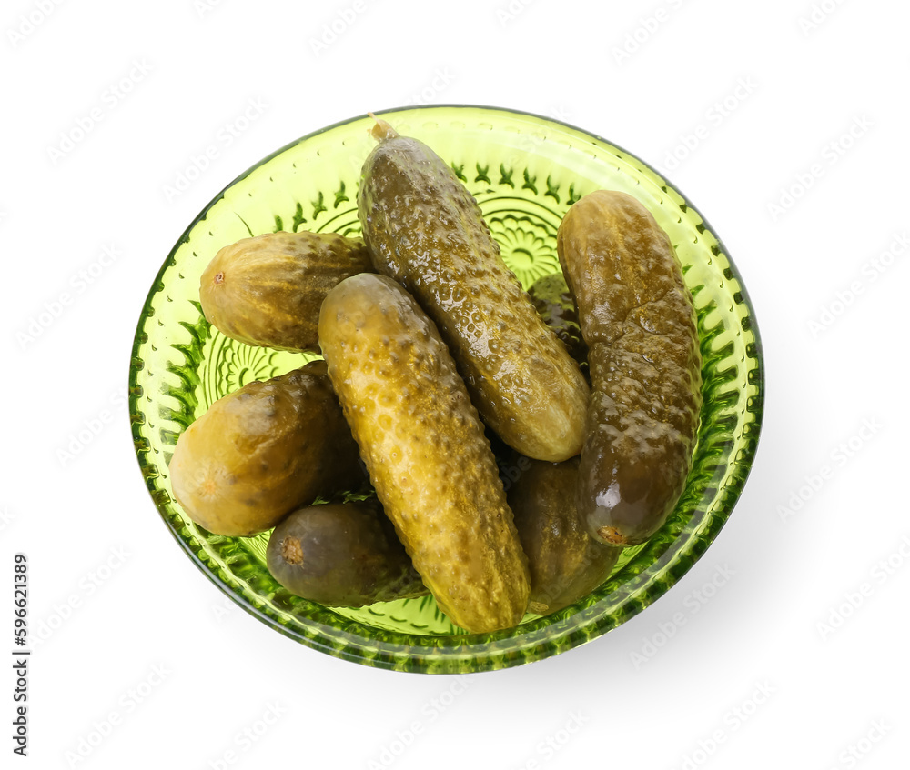 Bowl with tasty fermented cucumbers on white background