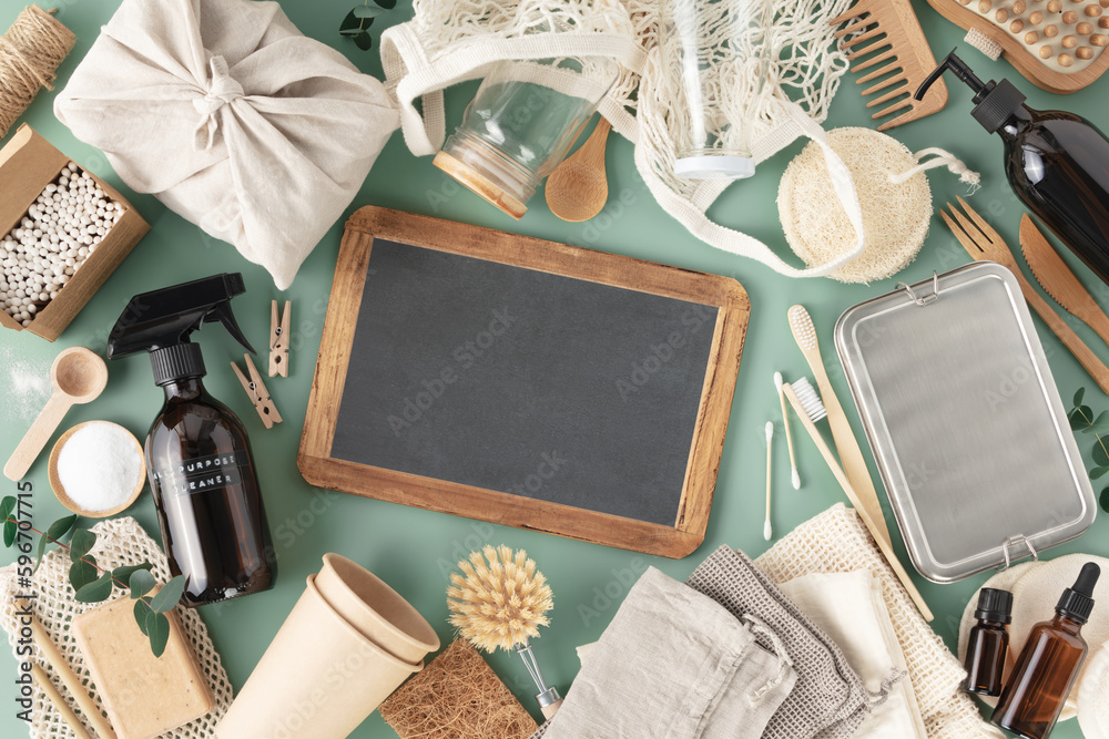 Set of eco-friendly tableware and cleaning products on pastel blue background, flat lay stop plastic