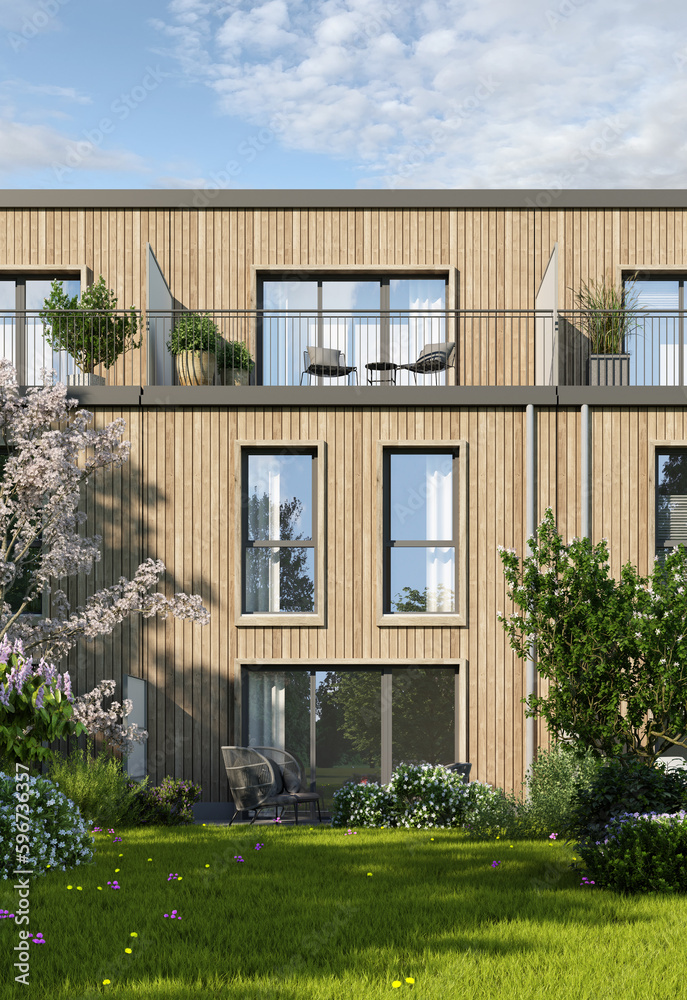 Reihenhaus mit Holzfassade mit Blick auf die Terrassenseite