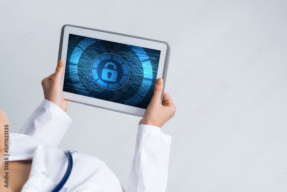 Close of female doctor hands working with tablet pc computer