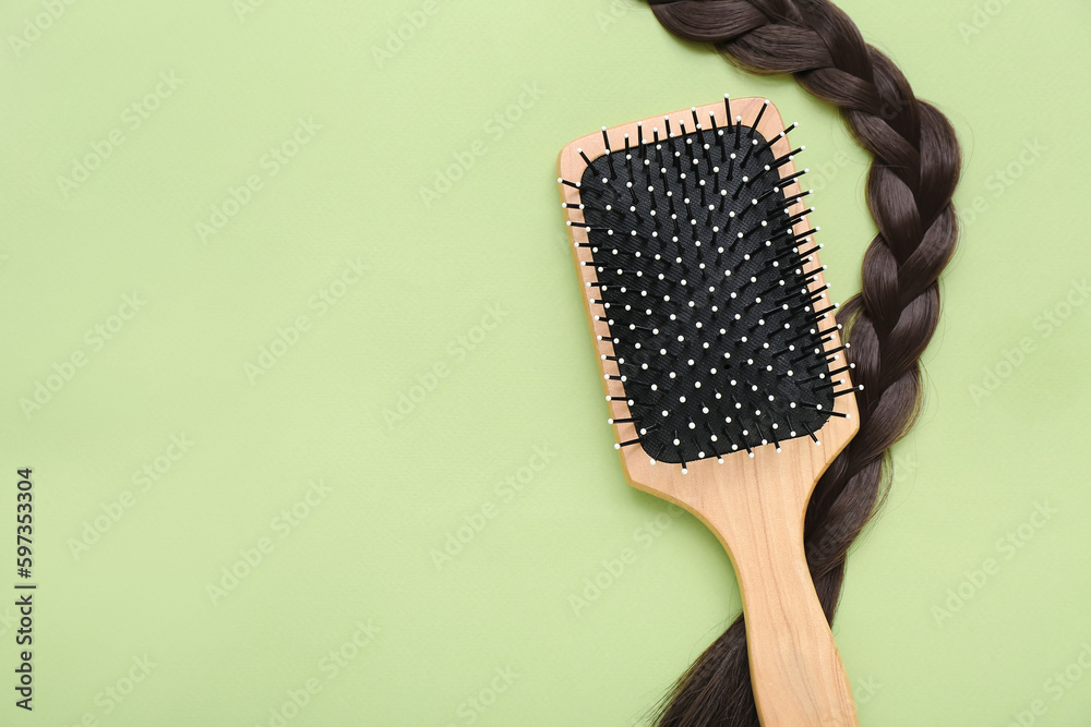 Braided strand with brush on green background