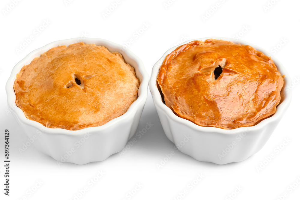 Tasty meat pot pies on white background